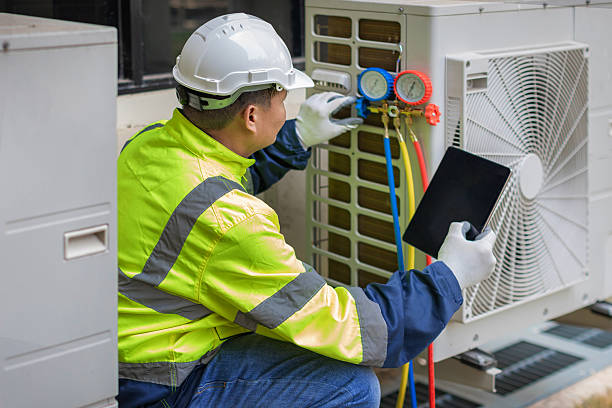 Professional Hvac technician working in Bassett, VA